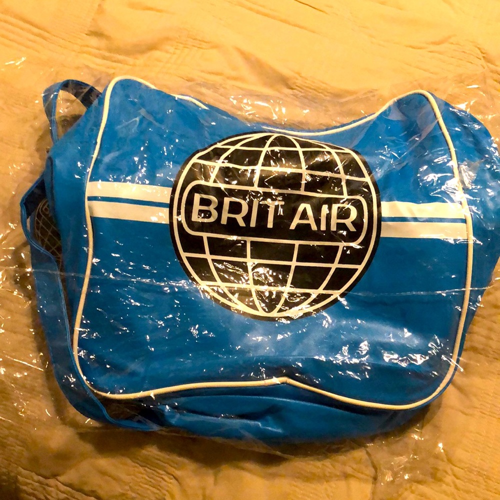 Loot Crate Britney Spears Toxic video inspired messenger crossbody bag.